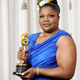 Mo’Nique, posing with her Oscar for best supporting actress for her role in Precious, at the Kodak Theatre in Hollywood, Calif., on March 7, 2010 (Jason Merritt/Getty Images)